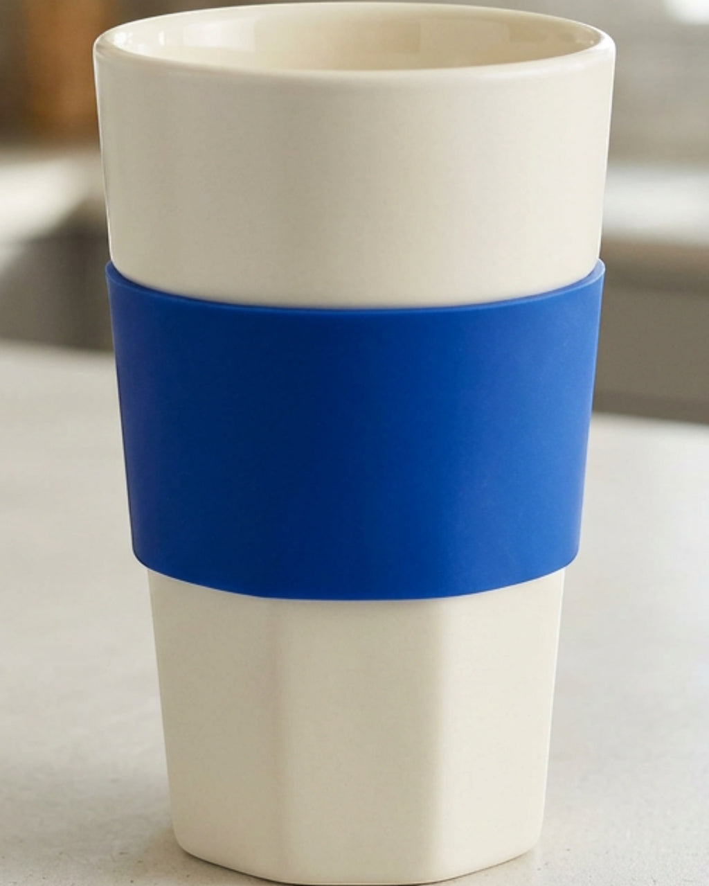 Gbwkn Six-Facet Ceramic Water Cup with Silicone Grip Sleeve 14 oz Ivory Cobalt - Lifestyle view